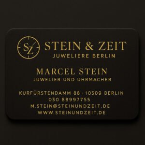 Luxuriöse schwarze Visitenkarte eines Juweliers und Uhrmachers mit goldener Prägung und klassischem Logo.